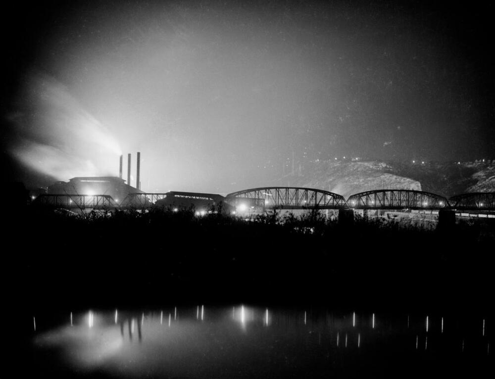 Charles 'Teenie' Harris, View of the Hot Metal Bridge and mill smoke stacks on Monongahela River, at night, ca. 1935-1950