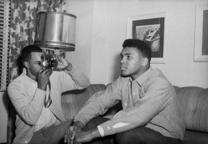 Charles "Teenie" Harris - Photographer taking picture of Muhammad Ali (Cassius Clay), Downtown Pittsburgh, 1963