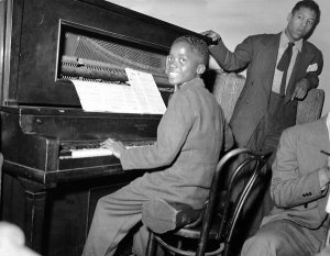 Charles "Teenie" Harris - Young Ahmad Jamal (Fritz Jones) playing piano, ca. 1942