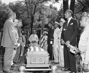 Charles "Teenie" Harris - Military funeral with funeral director and servicemen surrounding casket at graveside, ca. 1950-1965