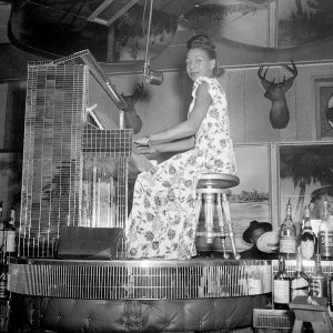 Charles "Teenie" Harris - Alyce Brooks playing mirrored piano in Continental Bar at Crawford Grill No. 1, ca. 1945-1946