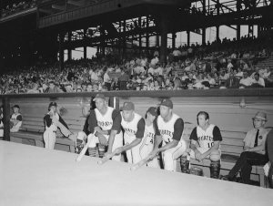 Charles "Teenie" Harris - Pittsburgh Pirates baseball team players holding bats, in dugout at Forbes Field, 1965