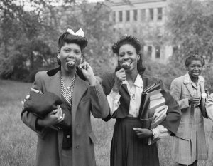 Charles "Teenie" Harris - Young women eating caramel apples, Pittsburgh, ca. 1940-1946
