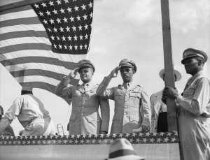 Charles "Teenie" Harris - Two men wearing U.S. Army uniforms, possibly including Major George S. Roberts on left, saluting on reviewing stand, ca. 1944
