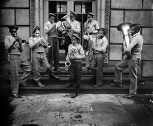 Charles "Teenie" Harris - Boys playing brass instruments on steps inside courtyard of Pittsburgh Board of Education building, Oakland, ca. 1938-1945
