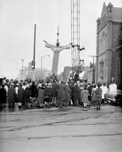 Charles "Teenie" Harris - Crane lifting St. Benedict the Moor statue off ground, 1968