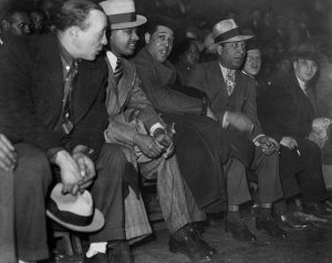 Charles "Teenie" Harris - Duke Ellington with William "Woogie" Harris and others watching the Pittsburgh Pirates, 1938
