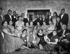 Charles "Teenie" Harris - Group portrait of Links members gathered for New Years party in the home of William and Daisy Lampkin, December 1955