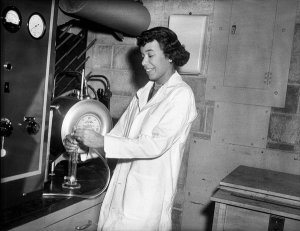 Charles "Teenie" Harris - Portrait of Cecile Springer in organic chemistry laboratory at the University of Pittsburgh, November-December 1961