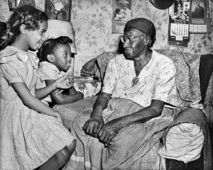 Charles "Teenie" Harris - Roberta Thomas and Joyce L. Addaway with former slave Sabre "Mother" Washington, Homewood, ca. 1949