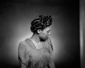 Charles "Teenie" Harris - Portrait of Blanche Murray modeling hairstyle, April 1941
