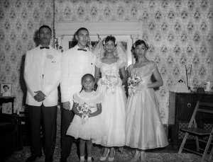 Charles "Teenie" Harris - Group portrait, including groom George Henderson and bride Jean Bruce Henderson, ca. 1956