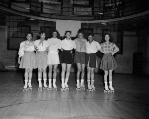 Charles "Teenie" Harris - Young women in roller skating outfits at the Centre Avenue YMCA in the Hill District, c. 1940-1955
