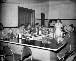 Charles "Teenie" Harris - People gathered at Lunch counter at the Centre Avenue YMCA, c. 1946