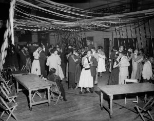 Charles "Teenie" Harris - Young men and women dancing in Centre Avenue YMCA gymnasium, c. 1954