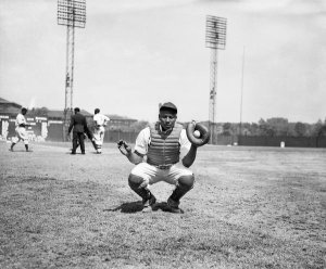 Charles "Teenie" Harris - Homestead Grays baseball catcher Josh Gibson crouched on Forbes Field, 1942