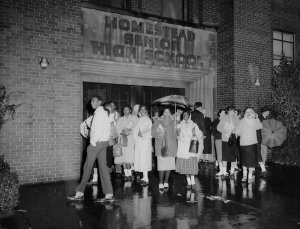 Charles "Teenie" Harris - Crowd of young men and women standing in front of  Homestead Senior High School, c. 1958