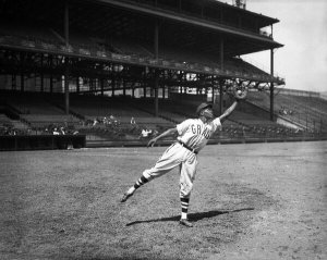 Charles "Teenie" Harris - Homestead Grays baseball player reaching to make a catch, Forbes Field, 1942