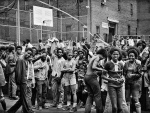 Charles "Teenie" Harris - Children and adolescents on playground and basketball court, Sheridan Mfg. building, c. 1968-1975